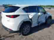 2022 Mazda CX-5 S Select z VIN JM3KFBBM6N0554189, wystawiony jako IAAI lot #42518384 z przebiegiem 46 491 mil mil oraz . Historia ofert i sprzedaży dostępna na DreamBid. Obrazek 4.