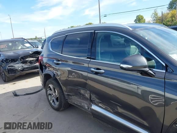 2021 Hyundai Santa Fe SEL z VIN 5NMS3DAJ0MH345114, wystawiony jako IAAI lot #43343253 z przebiegiem 52 092 mil mil oraz . Historia ofert i sprzedaży dostępna na DreamBid. Obrazek 13.