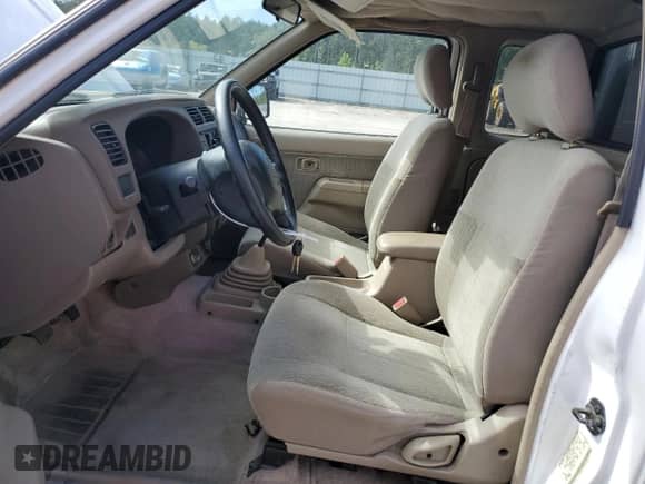 1998 Nissan Frontier XE with VIN 1N6DD26S5WC311065, listed as a Copart auction lot 84643135 with 212,985 mi miles and Salvage title. Bid and sale history available at DreamBid. Image 7.