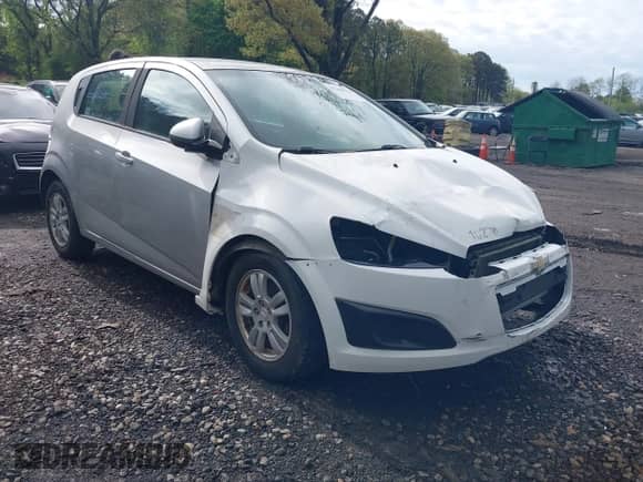 2012 Chevrolet Sonic LS with VIN 1G1JB6SH4C4198334, listed as a IAAI auction lot 42200028 with 207,498 mi miles and . Bid and sale history available at DreamBid. Image 1.