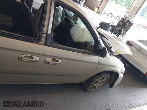 2003 Dodge Caravan Sport with VIN 2D4GP44L53R131671, listed as a IAAI auction lot 42488964 with Not provided miles and . Bid and sale history available at DreamBid. Image 12.