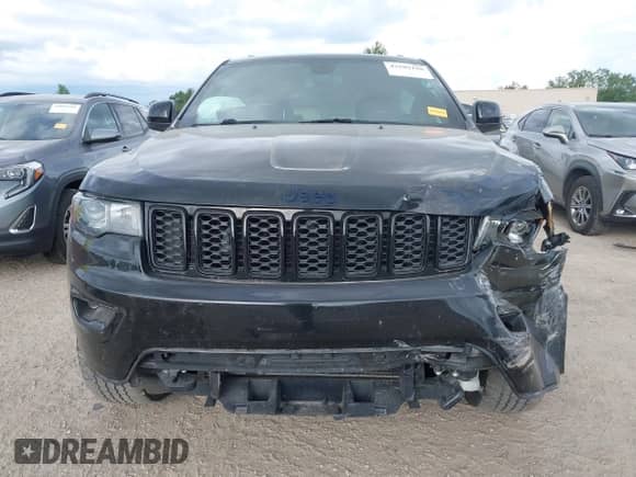 2020 Jeep Grand Cherokee Laredo E with VIN 1C4RJFAG3LC134667, listed as a IAAI auction lot 43103196 with 107,832 mi miles and . Bid and sale history available at DreamBid. Image 13.