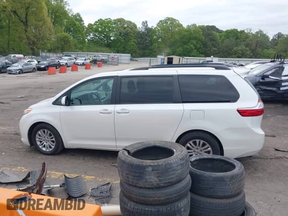 2016 Toyota Sienna XLE with VIN 5TDYK3DC1GS723205, listed as a IAAI auction lot 42044316 with 129,540 mi miles and . Bid and sale history available at DreamBid. Image 14.