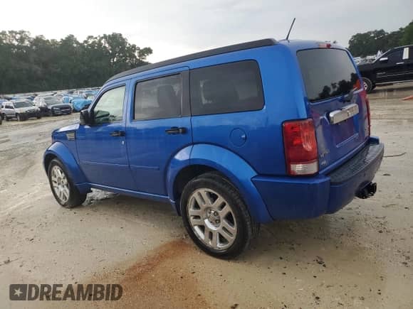 2008 Dodge Nitro R/T with VIN 1D8GU58658W126874, listed as a Copart auction lot 64047895 with 127,794 mi miles and Salvage title. Bid and sale history available at DreamBid. Image 2.