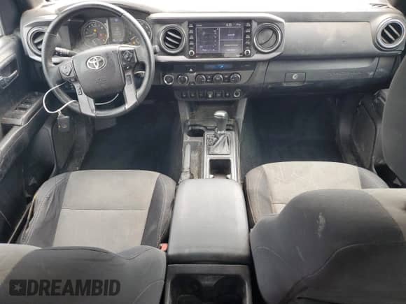 2021 Toyota Tacoma SR5 с VIN 3TMDZ5BNXMM116533, выставлен на аукционе Copart как лот 65466385 с пробегом 79 077 миль миль и Списание • Salvage title. История ставок и продаж доступна на DreamBid. Изображение 8.