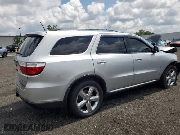 2013 Dodge Durango Citadel with VIN 1C4SDJETXDC616010, listed as a Copart auction lot 64638195 with 160,922 mi miles and Salvage title. Bid and sale history available at DreamBid. Image 3.