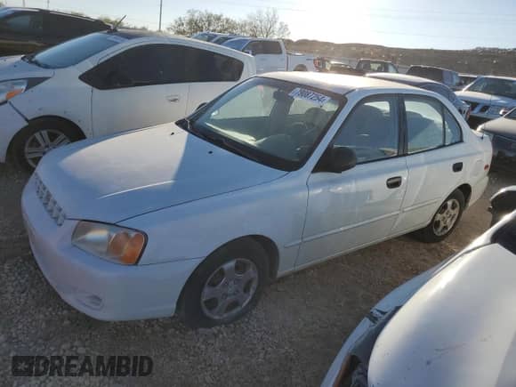 2002 Hyundai Accent GL с VIN KMHCG45C82U380280, выставлен на аукционе Copart как лот 79087254 с пробегом 173 764 миль миль и Чистый • Clean title. История ставок и продаж доступна на DreamBid. Изображение 1.