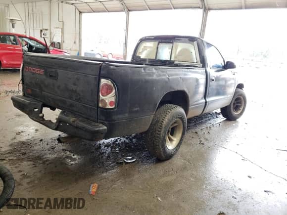 1998 Dodge Dakota SLT z VIN 1B7FL26Y9WS767160, wystawiony jako Copart lot #85257634 z przebiegiem 217 165 mil mil oraz Szkoda całkowita • Salvage title. Historia ofert i sprzedaży dostępna na DreamBid. Obrazek 3.