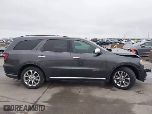 2017 Dodge Durango Citadel z VIN 1C4RDHEG8HC690154, wystawiony jako IAAI lot #41531898 z przebiegiem 142 392 mil mil oraz . Historia ofert i sprzedaży dostępna na DreamBid. Obrazek 13.