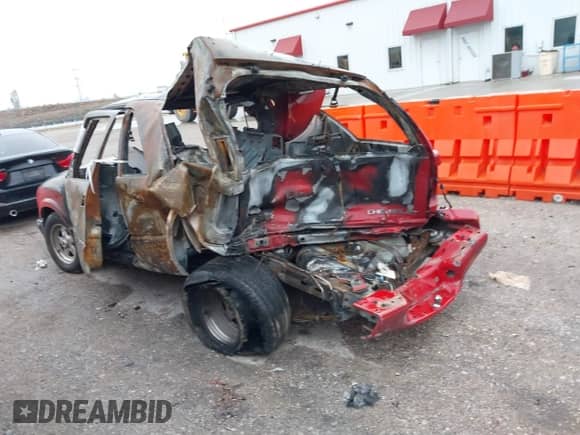 2001 Chevrolet Blazer LS with VIN 1GNCS18W91K256978, listed as a IAAI auction lot 41532812 with Not provided miles and . Bid and sale history available at DreamBid. Image 3.