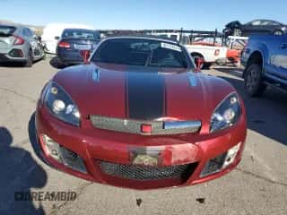 2009 Saturn Sky with VIN 1G8MH35X79Y105127, listed as a Copart auction lot 86133424 with 76,747 mi miles and Salvage title. Bid and sale history available at DreamBid. Image 5.