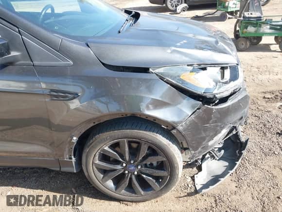 2017 Ford Escape Titanium with VIN 1FMCU0J90HUB61155, listed as a IAAI auction lot 43352339 with 100,918 mi miles and . Bid and sale history available at DreamBid. Image 18.