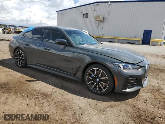 2025 BMW i4 eDrive40 with VIN WBY23HD05SFU42876, listed as a Copart auction lot 80259765 with 7,530 mi miles and Salvage title. Bid and sale history available at DreamBid. Image 4.