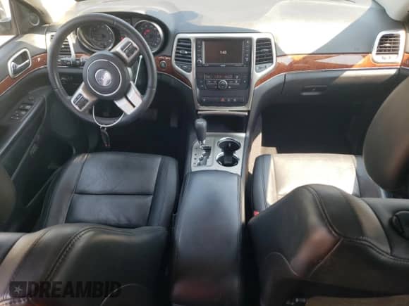 2013 Jeep Grand Cherokee Limited with VIN 1C4RJFBG5DC633776, listed as a Copart auction lot 80206735 with 170,991 mi miles and Salvage title. Bid and sale history available at DreamBid. Image 8.