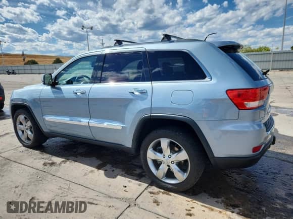 2013 Jeep Grand Cherokee Limited z VIN 1C4RJFBT9DC573370, wystawiony jako Copart lot #80716325 z przebiegiem 151 832 mil mil oraz Czysty tytuł • Clean title. Historia ofert i sprzedaży dostępna na DreamBid. Obrazek 2.