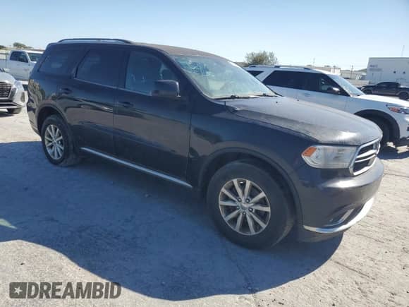 2014 Dodge Durango SXT with VIN 1C4RDJAG7EC267364, listed as a Copart auction lot 87245605 with 191,592 mi miles and Clean title. Bid and sale history available at DreamBid. Image 4.