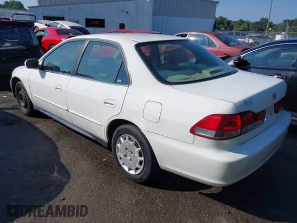 2002 Honda Accord LX with VIN JHMCG56412C004736, listed as a IAAI auction lot 43011114 with 271,977 mi miles and . Bid and sale history available at DreamBid. Image 3.