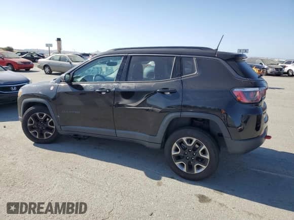 2017 Jeep Compass Trailhawk with VIN 3C4NJDDB1HT689762, listed as a Copart auction lot 60937205 with 99,282 mi miles and Salvage title. Bid and sale history available at DreamBid. Image 2.