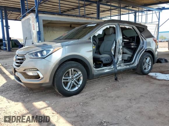 2018 Hyundai Santa Fe 2.4L с VIN 5NMZU3LB5JH053756, выставлен на аукционе Copart как лот 70347355 с пробегом 30 817 миль миль и Списание • Salvage title. История ставок и продаж доступна на DreamBid. Изображение 1.