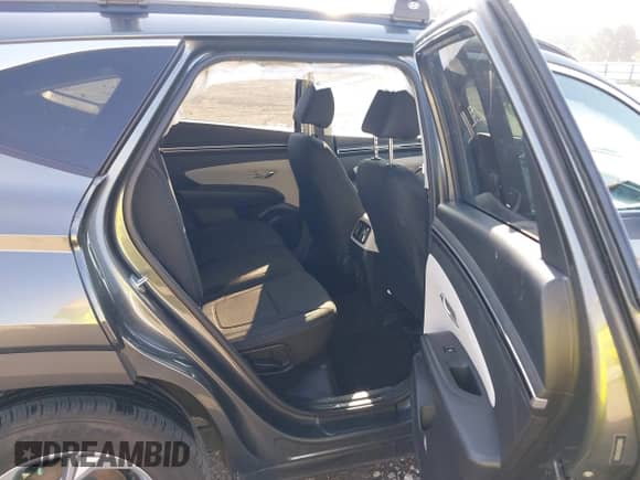 2022 Hyundai Tucson SEL with VIN 5NMJB3AE5NH150901, listed as a IAAI auction lot 43232299 with 72,731 mi miles and . Bid and sale history available at DreamBid. Image 8.