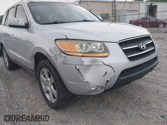 2009 Hyundai Santa Fe Limited z VIN 5NMSH73E69H288976, wystawiony jako IAAI lot #42276140 z przebiegiem 240 239 mil mil oraz . Historia ofert i sprzedaży dostępna na DreamBid. Obrazek 6.