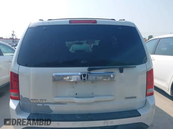 2015 Honda Pilot Touring с VIN 5FNYF3H92FB007774, выставлен на аукционе IAAI как лот 43083627 с пробегом 148 676 миль миль и . История ставок и продаж доступна на DreamBid. Изображение 16.