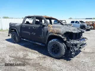 2023 Ram 1500 TRX z VIN 1C6SRFU92PN500787, wystawiony jako IAAI lot #42072607 z przebiegiem Nie podano mil oraz . Historia ofert i sprzedaży dostępna na DreamBid. Obrazek 1.