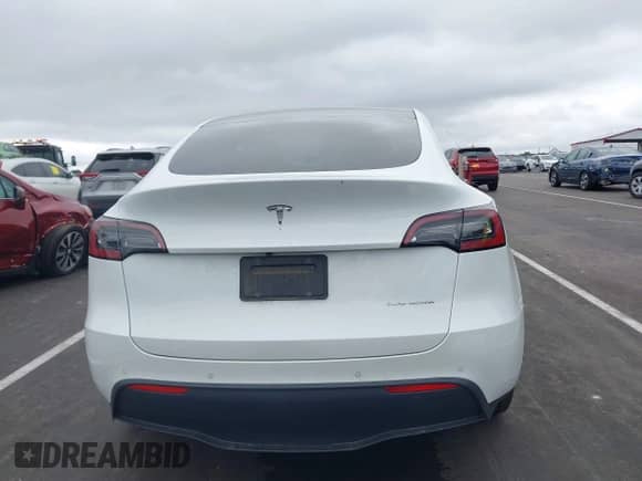 2022 Tesla Model Y Long Range z VIN 7SAYGDEE6NF317707, wystawiony jako IAAI lot #43186532 z przebiegiem 45 306 mil mil oraz . Historia ofert i sprzedaży dostępna na DreamBid. Obrazek 17.