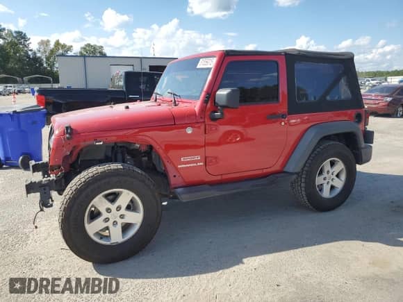 2010 Jeep Wrangler Sport with VIN 1J4AA2D13AL230819, listed as a Copart auction lot 81859015 with 104,290 mi miles and Salvage title. Bid and sale history available at DreamBid. Image 1.