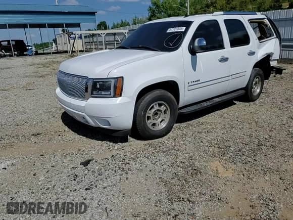 2007 Chevrolet Tahoe LT с VIN 1GNFC13J97R294233, выставлен на аукционе Copart как лот 81701645 с пробегом 233 139 миль миль и Чистый • Clean title. История ставок и продаж доступна на DreamBid. Изображение 15.