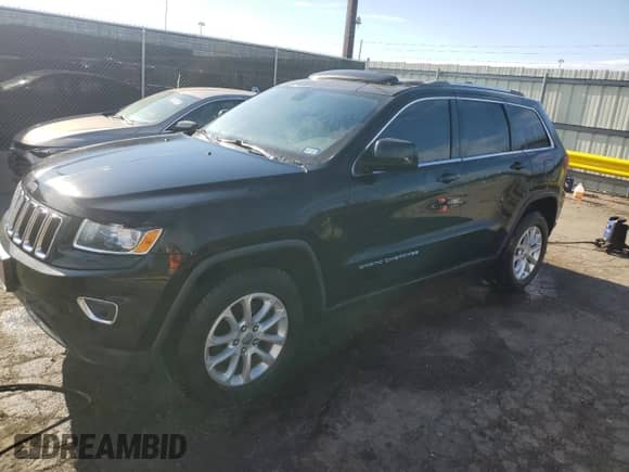 2014 Jeep Grand Cherokee Laredo with VIN 1C4RJEAG9EC145007, listed as a Copart auction lot 86271595 with 185,490 mi miles and Clean title. Bid and sale history available at DreamBid. Image 1.