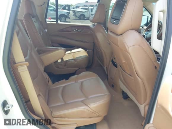 2015 Cadillac Escalade Platinum z VIN 1GYS4PKJ3FR642643, wystawiony jako IAAI lot #42927528 z przebiegiem 95 428 mil mil oraz . Historia ofert i sprzedaży dostępna na DreamBid. Obrazek 8.