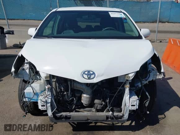 2016 Toyota Sienna SE with VIN 5TDXK3DC0GS702003, listed as a IAAI auction lot 41957604 with 41,409 mi miles and . Bid and sale history available at DreamBid. Image 13.