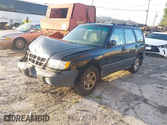1999 Subaru Forester L with VIN JF1SF6352XH707734, listed as a IAAI auction lot 42783352 with 125,177 mi miles and . Bid and sale history available at DreamBid. Image 2.