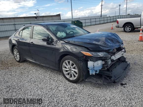 2021 Toyota Camry LE z VIN 4T1C11AK3MU603065, wystawiony jako Copart lot #85377175 z przebiegiem 50 941 mil mil oraz Szkoda całkowita • Salvage title. Historia ofert i sprzedaży dostępna na DreamBid. Obrazek 4.