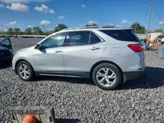 2018 Chevrolet Equinox Premier with VIN 2GNAXMEV5J6138631, listed as a Copart auction lot 81776555 with 151,906 mi miles and Salvage title. Bid and sale history available at DreamBid. Image 2.