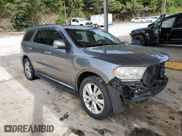 2013 Dodge Durango Crew with VIN 1C4RDHDG1DC508595, listed as a Copart auction lot 70738445 with 135,209 mi miles and Salvage title. Bid and sale history available at DreamBid. Image 4.