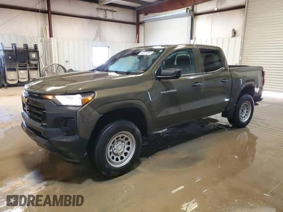 2023 Chevrolet Colorado 2WD Work Truck z VIN 1GCGSBEC7P1182517, wystawiony jako Copart lot #71043925 z przebiegiem 14 407 mil mil oraz Czysty tytuł • Clean title. Historia ofert i sprzedaży dostępna na DreamBid. Obrazek 1.