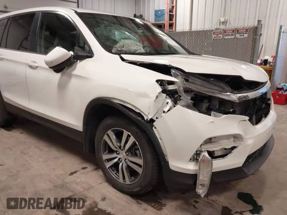 2018 Honda Pilot EX-L z VIN 5FNYF6H5XJB000904, wystawiony jako IAAI lot #43374737 z przebiegiem 166 130 mil mil oraz . Historia ofert i sprzedaży dostępna na DreamBid. Obrazek 19.