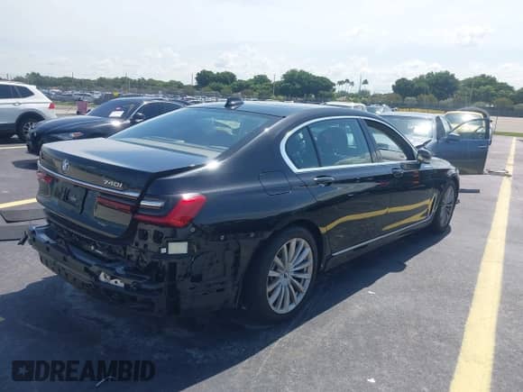 2022 BMW 7 Series 740i z VIN WBA7T2C02NCH73426, wystawiony jako IAAI lot #42641007 z przebiegiem 49 300 mil mil oraz . Historia ofert i sprzedaży dostępna na DreamBid. Obrazek 4.