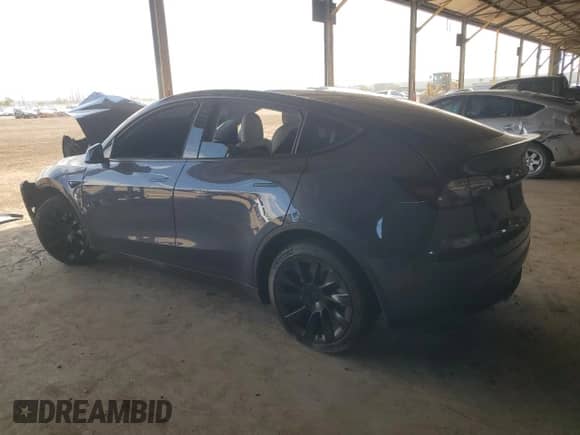 2021 Tesla Model Y Long Range with VIN 5YJYGDEE7MF206059, listed as a Copart auction lot 80559965 with 77,329 mi miles and Salvage title. Bid and sale history available at DreamBid. Image 2.