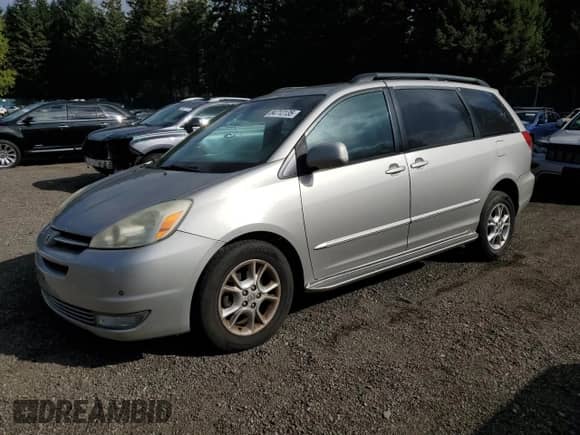 2005 Toyota Sienna XLE z VIN 5TDBA22CX5S051132, wystawiony jako Copart lot #84712135 z przebiegiem 179 807 mil mil oraz Szkoda całkowita • Salvage title. Historia ofert i sprzedaży dostępna na DreamBid. Obrazek 1.
