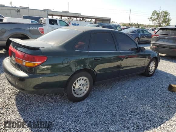 2000 Saturn LS with VIN 1G8JU52F2YY634232, listed as a Copart auction lot 52672235 with 130,772 mi miles and Salvage title. Bid and sale history available at DreamBid. Image 3.