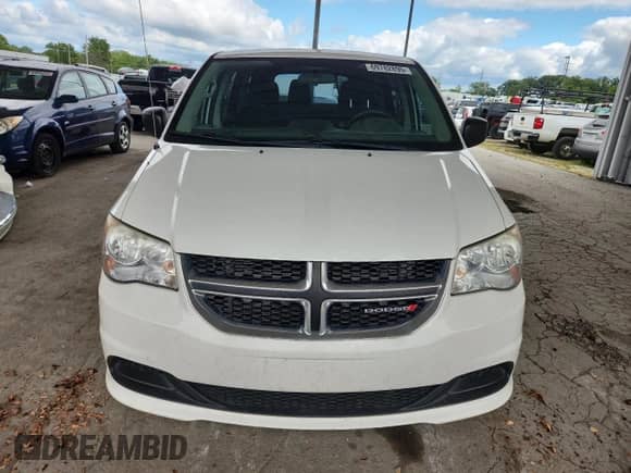 2013 Dodge Grand Caravan American Value with VIN 2C4RDGBG6DR765319, listed as a Copart auction lot 69782895 with 129,861 mi miles and Salvage title. Bid and sale history available at DreamBid. Image 5.