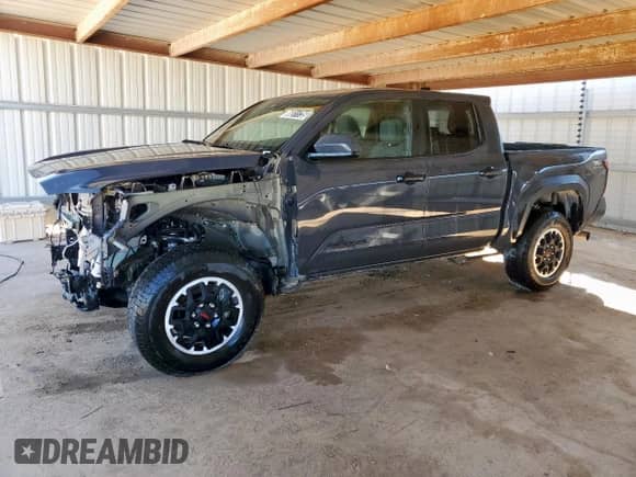 2024 Toyota Tacoma TRD Off Road with VIN 3TMLB5JN3RM035169, listed as a Copart auction lot 86511735 with 27,047 mi miles and Clean title. Bid and sale history available at DreamBid. Image 1.