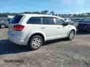 2015 Dodge Journey American Value z VIN 3C4PDCAB4FT720305, wystawiony jako IAAI lot #43284296 z przebiegiem 197 779 mil mil oraz . Historia ofert i sprzedaży dostępna na DreamBid. Obrazek 4.