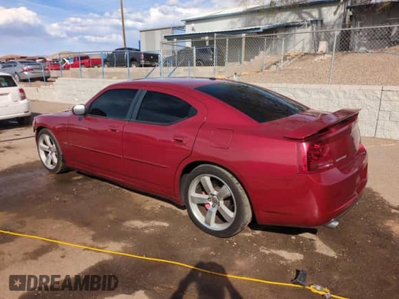 2006 Dodge Charger SRT-8 с VIN 2B3LA73W56H369414, выставлен на аукционе Copart как лот 49818765 с пробегом 117 563 миль миль и Списание • Salvage title. История ставок и продаж доступна на DreamBid. Изображение 2.