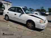 2002 Hyundai Accent GL z VIN KMHCG45C12U343720, wystawiony jako Copart lot #63329455 z przebiegiem 158 251 mil mil oraz Szkoda całkowita • Salvage title. Historia ofert i sprzedaży dostępna na DreamBid. Obrazek 4.