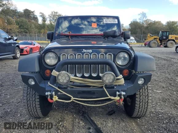 2012 Jeep Wrangler Sport with VIN 1C4AJWAG4CL237299, listed as a Copart auction lot 82743155 with 226,287 mi miles and Clean title. Bid and sale history available at DreamBid. Image 5.