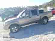 2001 Nissan Frontier SE with VIN 1N6ED27T01C347055, listed as a Copart auction lot 87753315 with 205,049 mi miles and Clean title. Bid and sale history available at DreamBid. Image 1.